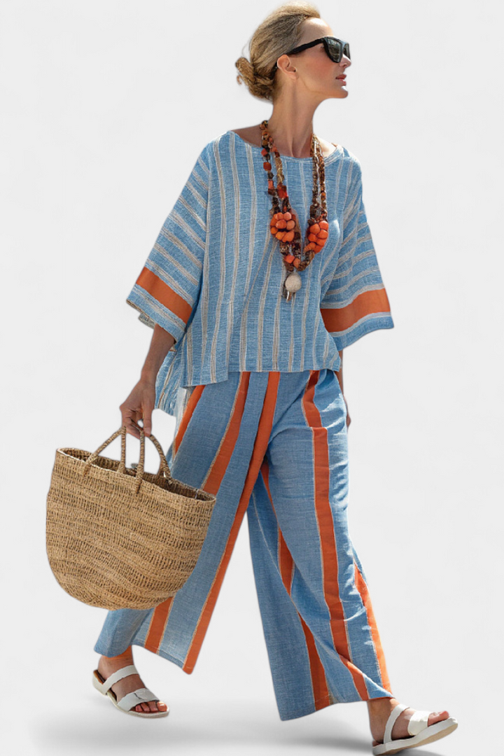 Valeria – top striato terracotta sofisticato e pantaloni in lino