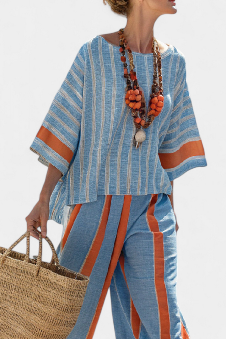 Valeria – top striato terracotta sofisticato e pantaloni in lino