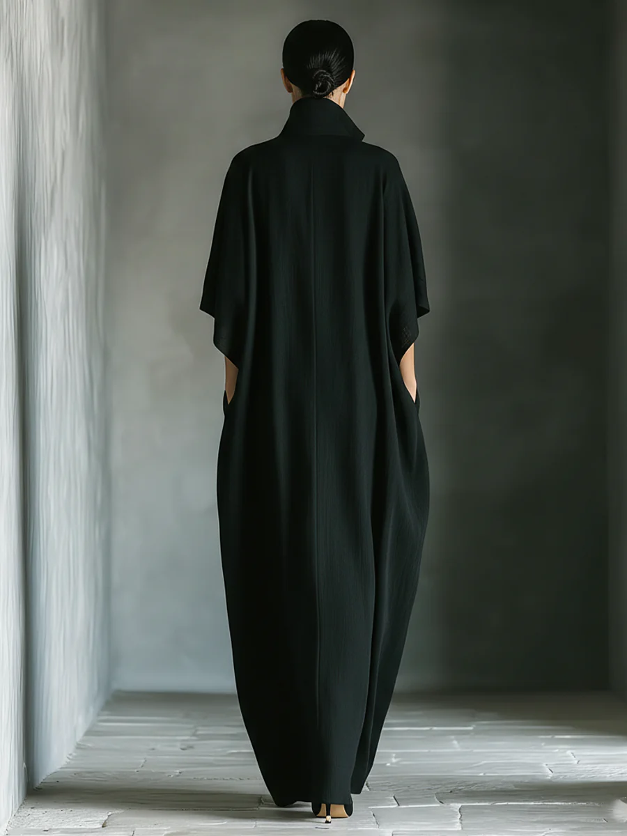 Alessandra | Vestito lungo nero oversize minimalista con maniche a kimono