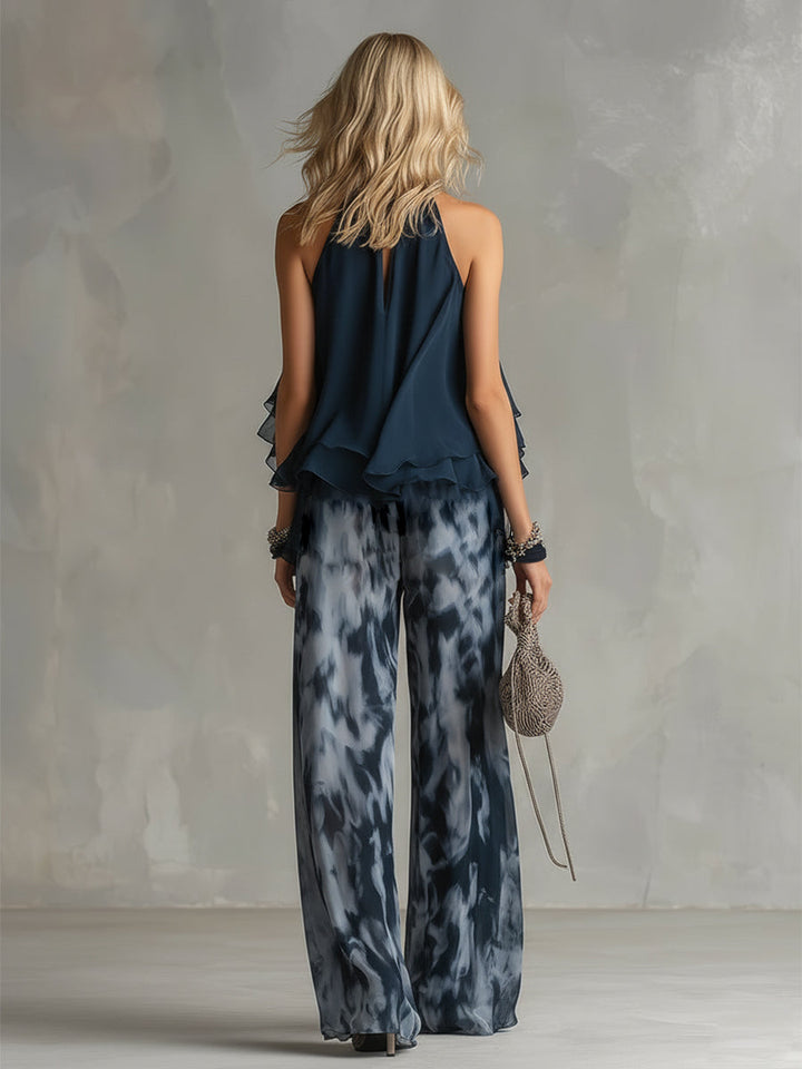 Ludovica - elegante in chiffon con top a collo alto e pantaloni larghi stampati
