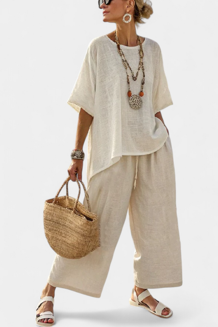 Completo Minimalista Daisy in tonalità cruda con blusa oversize e pantaloni larghi per uno stile semplice ed elegante